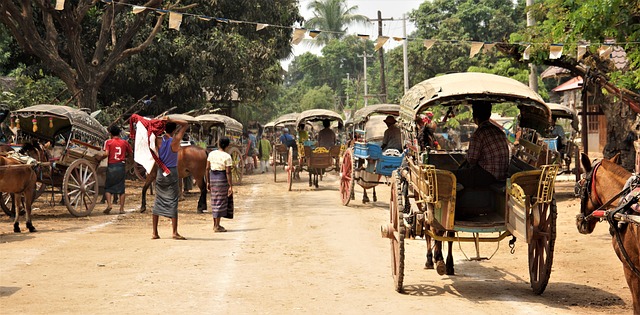 Traditional street market bustling with people and vibrant colors, representing cultural immersion.
